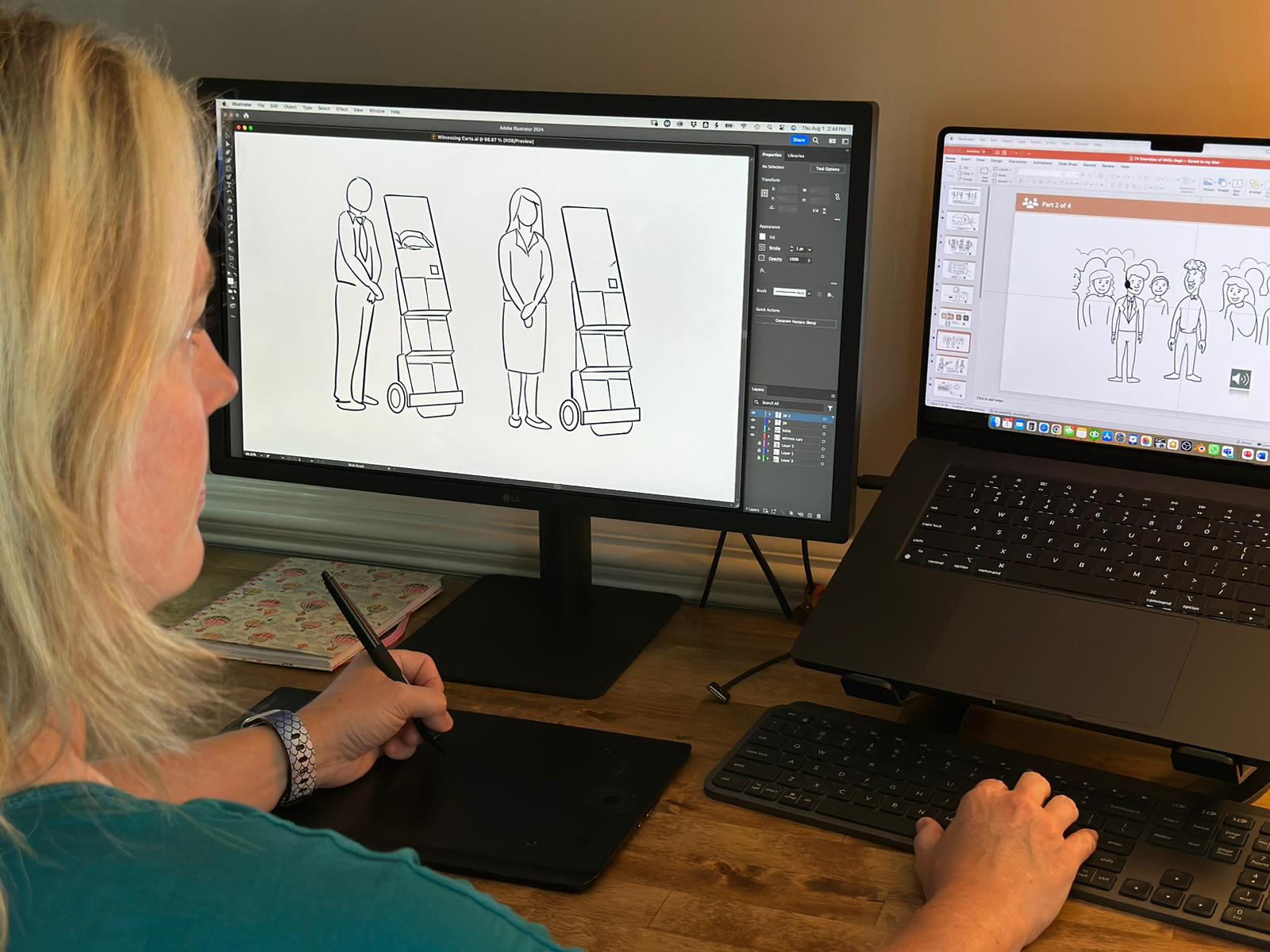 Amanda using a wacom tablet at her desk